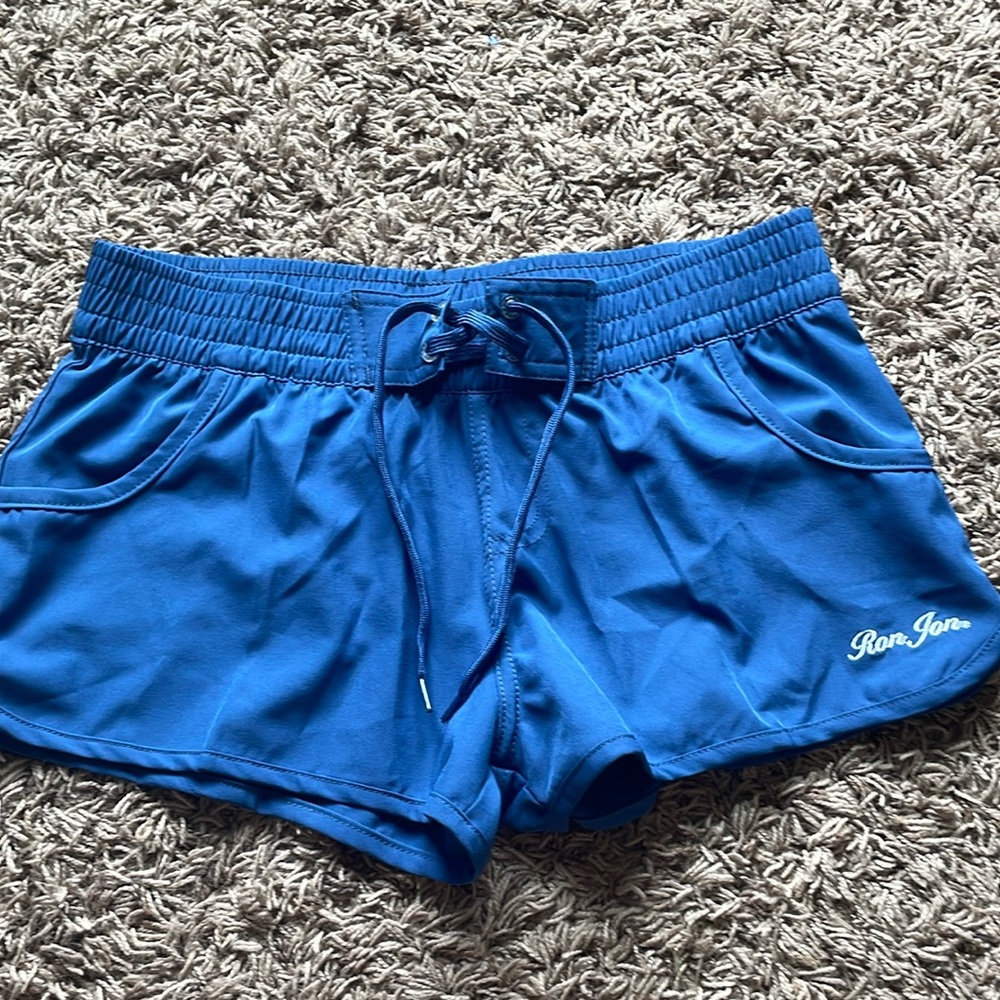 Never worn navy blue Ron Jon surf shop shorts.